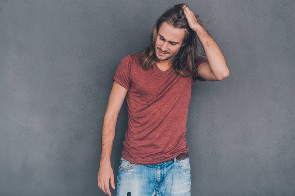 man with long hair in casual wear  - Photo, image