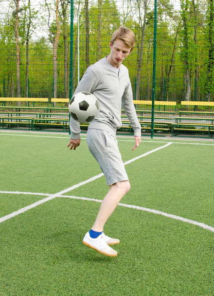 Young man making football freestyle - Photo, Image