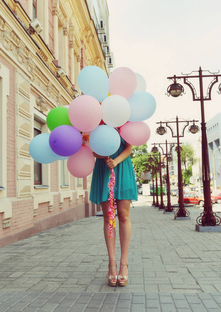 romantic woman with balloons - Foto, afbeelding
