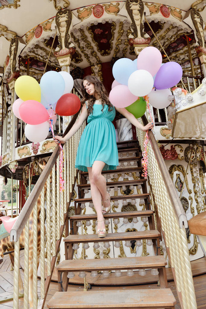woman with colored balloons - Foto, Bild