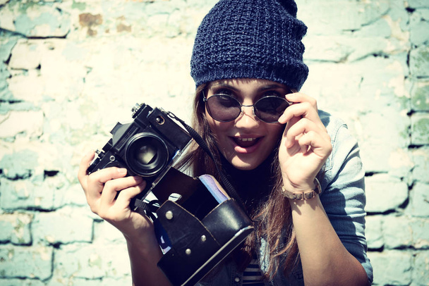 woman holding retro camera - Photo, image