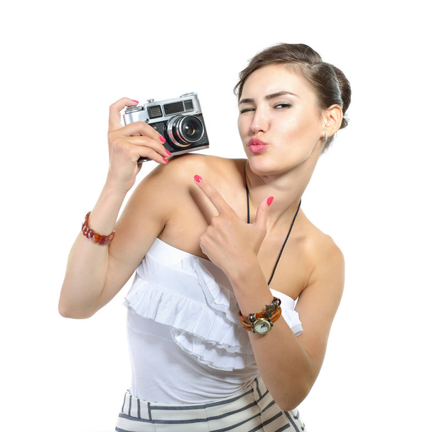 Beautiful woman holding retro camera - Foto, Bild