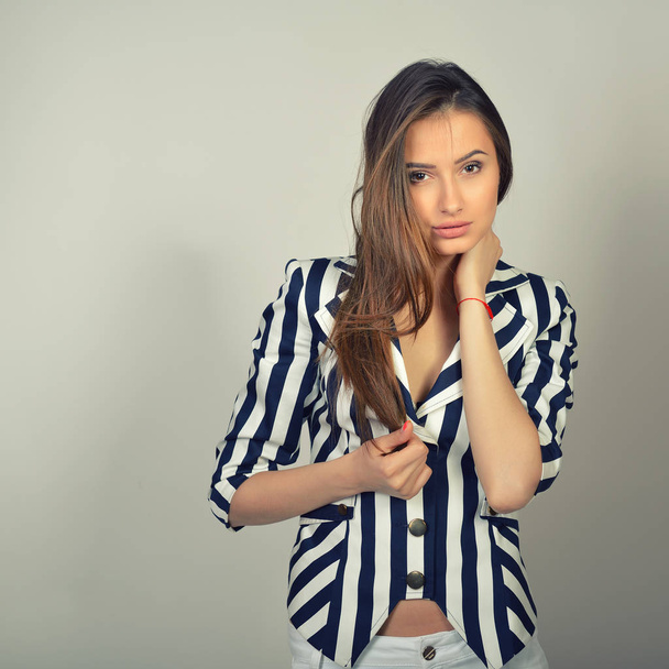 sexy woman in striped jacket - Fotó, kép
