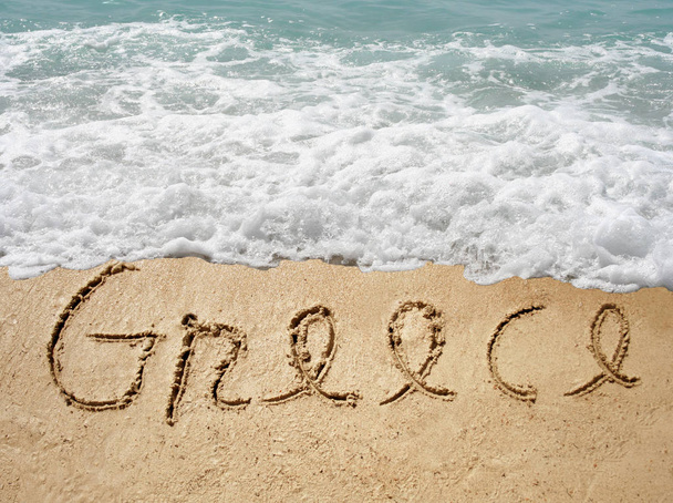 χειρόγραφο κείμενο Ελλάδα στην άμμο  - Φωτογραφία, εικόνα