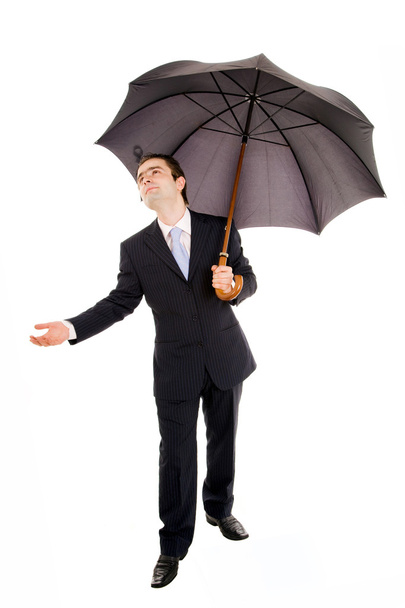 Full lenght of young business man with umbrella and checking the - Фото, изображение