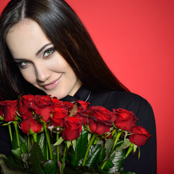 Woman with Red Roses - 写真・画像