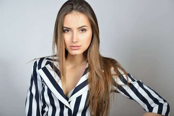 woman in striped jacket - Fotografie, Obrázek