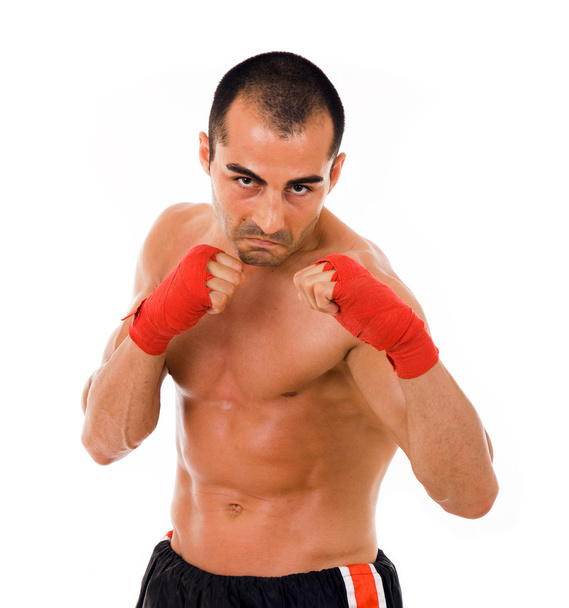 Portrait of young boxer fighter over white background - Photo, Image