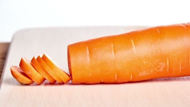 sliced carrot on a kitchen board- stop motion animation and timelapse - Footage, Video