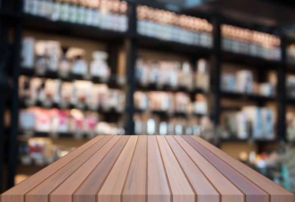 Перспективный роскошный деревянный верх с размытой кофейней backgroun
 - Фото, изображение