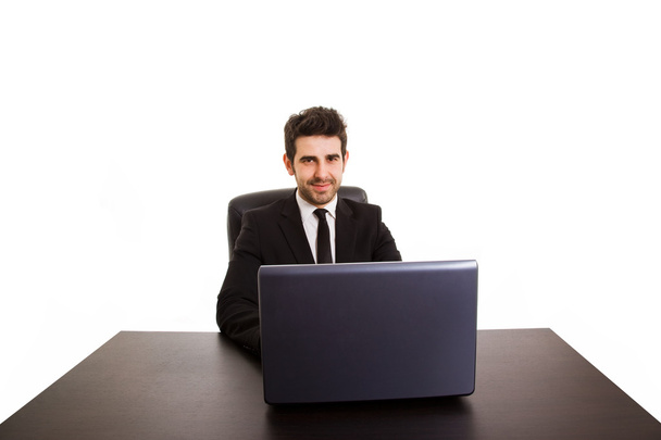 Portrait of happy smiling business man with laptop at office des - Fotoğraf, Görsel