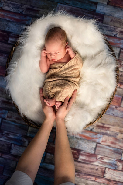 mom touch small newborn kid - 写真・画像