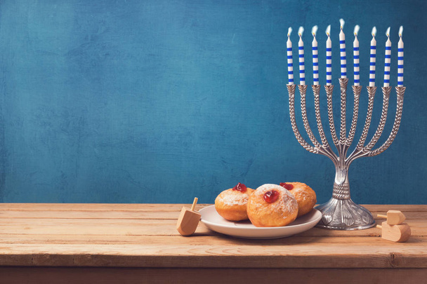 Hanukkah holiday sufganiyot and menorah - Φωτογραφία, εικόνα
