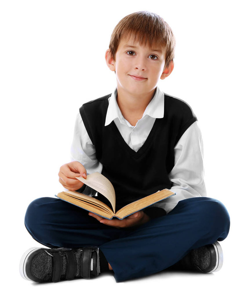 schoolboy reading book - Valokuva, kuva
