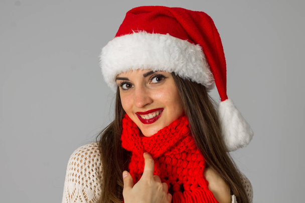 girl in santa hat and red scarf - Photo, image