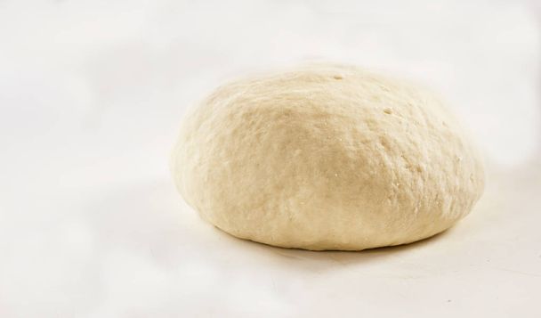 ball of raw dough over white background - Photo, Image