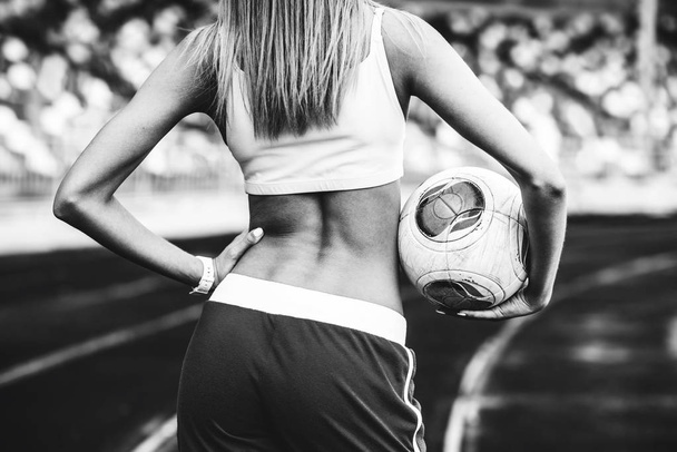 Girl workout on stadium - Zdjęcie, obraz