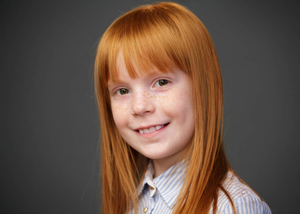 portrait of a cute ginger girl - Фото, изображение
