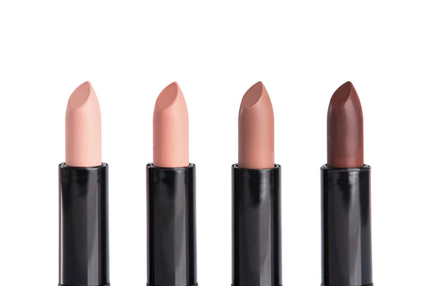 four lipsticks in trendy colors  - Zdjęcie, obraz
