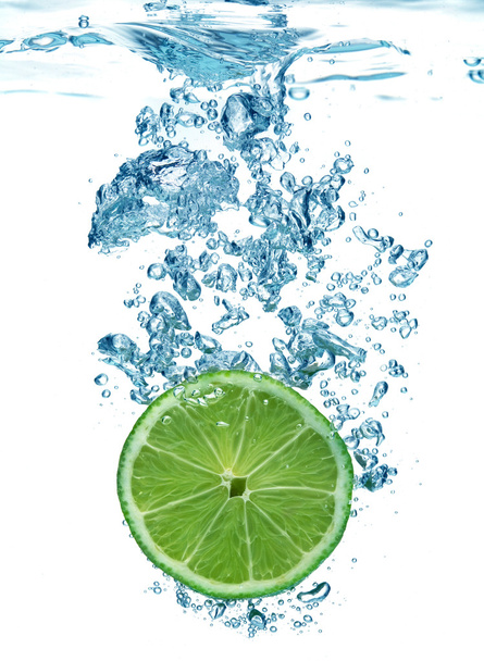 Lime slice in a water - Photo, Image