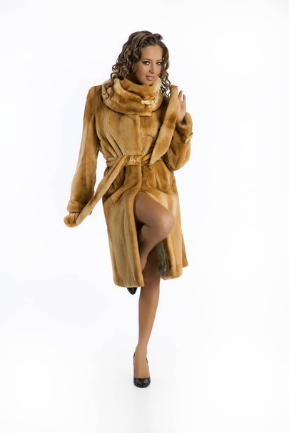 Young Attractive Woman In Fur Coat - Foto, imagen