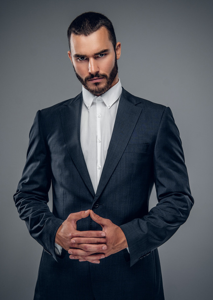 A trendy business man in a suit  - Zdjęcie, obraz