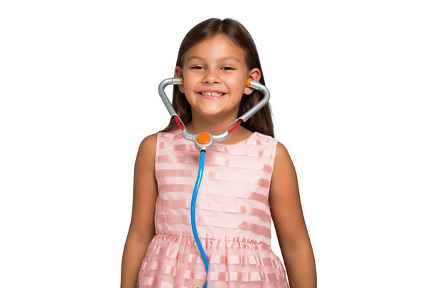 child using a toy stethoscope - Фото, изображение
