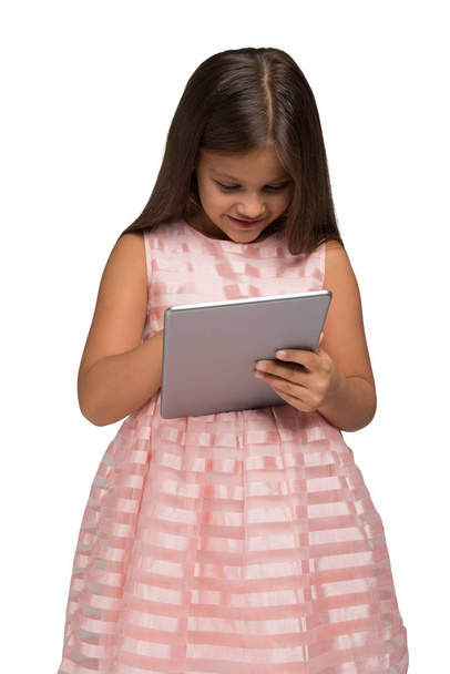 Smiling child using a tablet - Fotografie, Obrázek