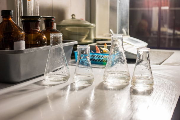 Beakers with transparent liquid. - Photo, Image