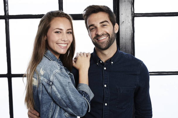 Smiling couple in denim clothes - Foto, Imagen