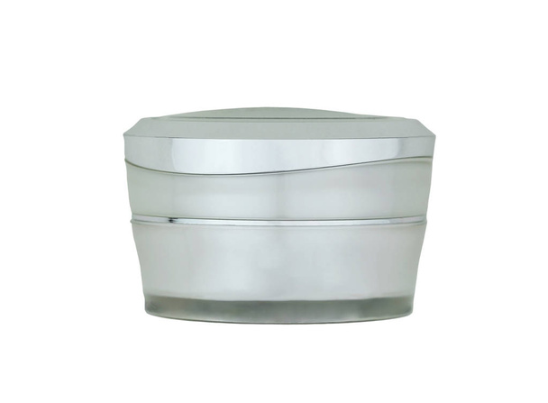 Glass closed jar of facial or body cream on white isolated background with clipping path. Front view. - Photo, Image