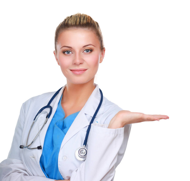 Portrait of a female doctor pointing, close-up, isolated on white background - Foto, Bild