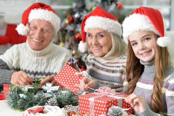 Family with Christmas presents - 写真・画像