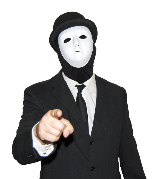 Businessman with a white mask and a hat pointing his finger at t - Photo, Image