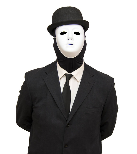 Επιχειρηματίας με μια λευκή μάσκα και ένα καπέλο - Φωτογραφία, εικόνα