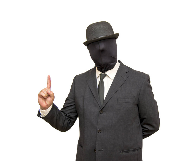Επιχειρηματίας με το κεφάλι του κρυφά από μια κουκούλα που γύρισε και ένα καπέλο - Φωτογραφία, εικόνα