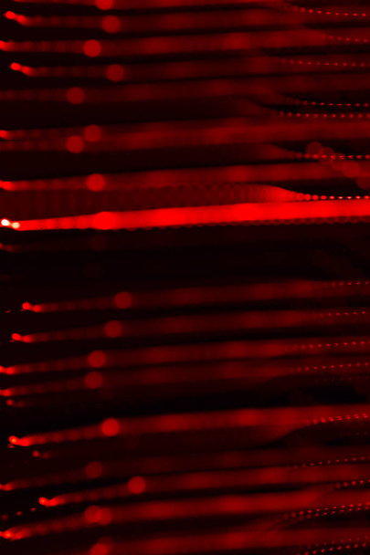 Background of red LED lights with bokeh effect - Photo, Image