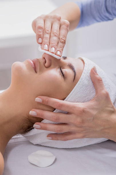woman enjoying facial massage at spa salon - Foto, Imagem