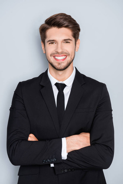 Portrait of happy successful man in suit with crossed hands - Foto, Imagen