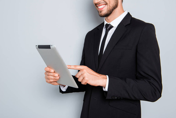 Close up of happy smiling successful man holding tablet - 写真・画像