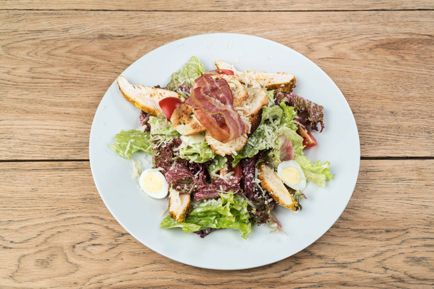 Beautifully served to the table Caesar salades - Фото, зображення
