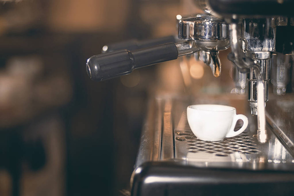 Coffee espresso. Espresso machine making coffee, golden espresso - Photo, Image