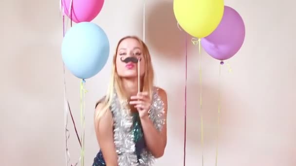 woman dancing with moustache - Filmati, video