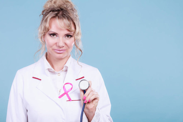 Doctor with pink cancer ribbon - 写真・画像