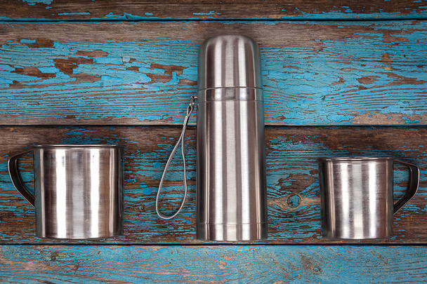 Metal thermos, strainer, mugs and spoons. - Fotoğraf, Görsel
