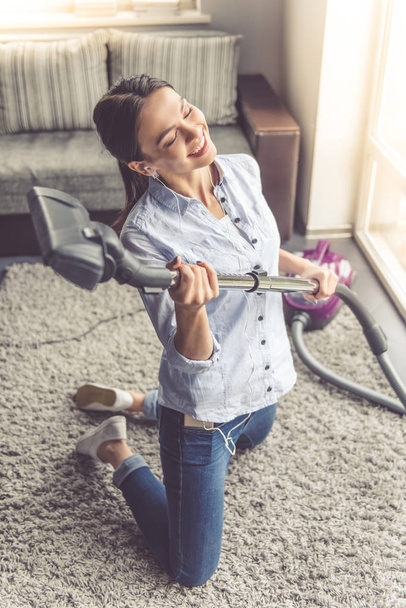 Woman cleaning her house - Photo, image