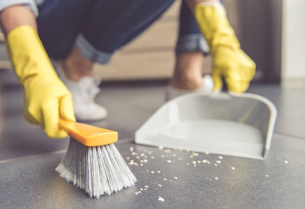 Woman cleaning her house - Фото, зображення