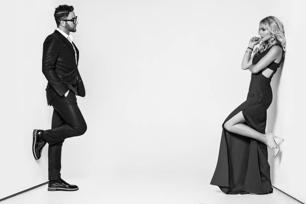 young fashion couple on a white background in studio - Fotoğraf, Görsel