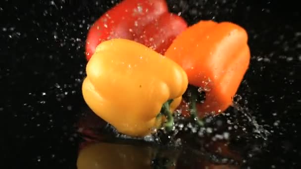 slow motion falling peppers - Video, Çekim