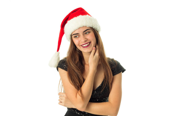 happy young girl in santa hat - Фото, зображення